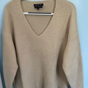 tan, oversized something navy sweater